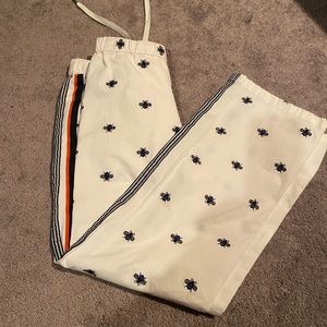 EUC ANTHROPOLOGIE drawstring pants. White embroidered with blue Bees